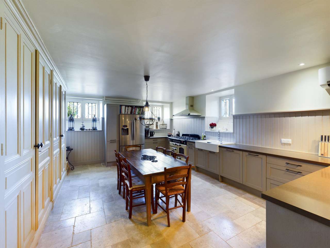 Nestling in over 6 acres of glorious landscaped gardens with pool, woodland