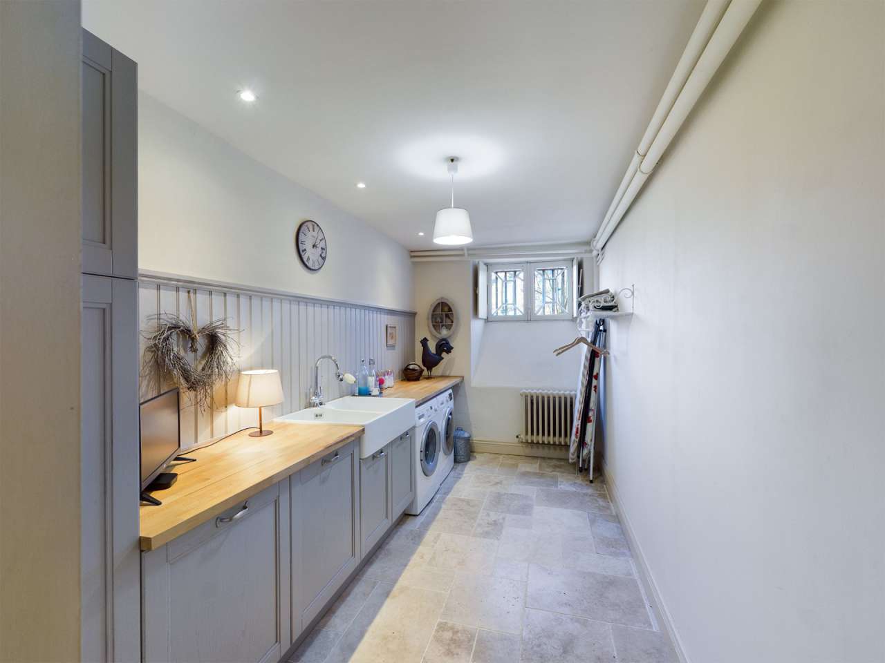 Nestling in over 6 acres of glorious landscaped gardens with pool, woodland