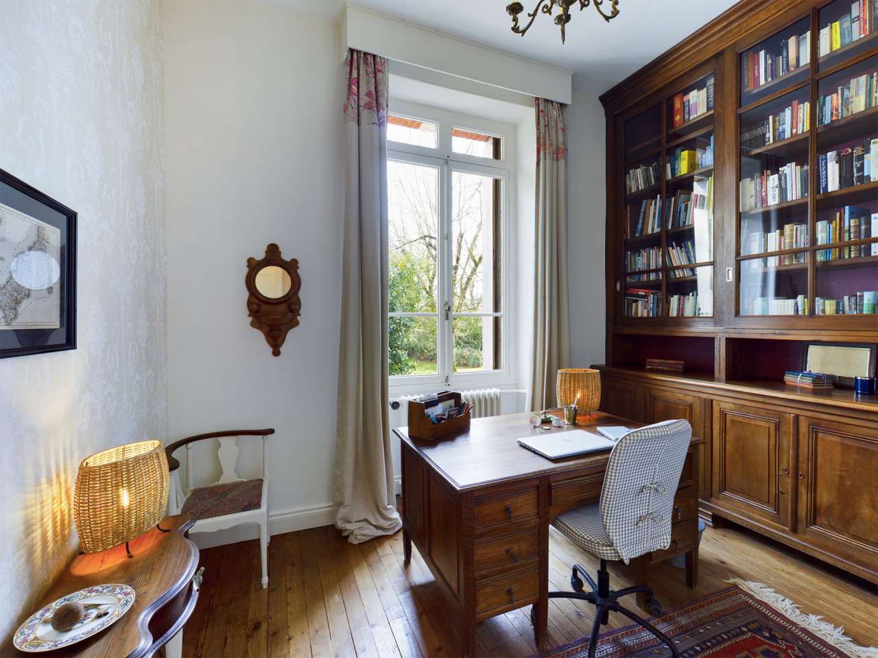 Nestling in over 6 acres of glorious landscaped gardens with pool, woodland