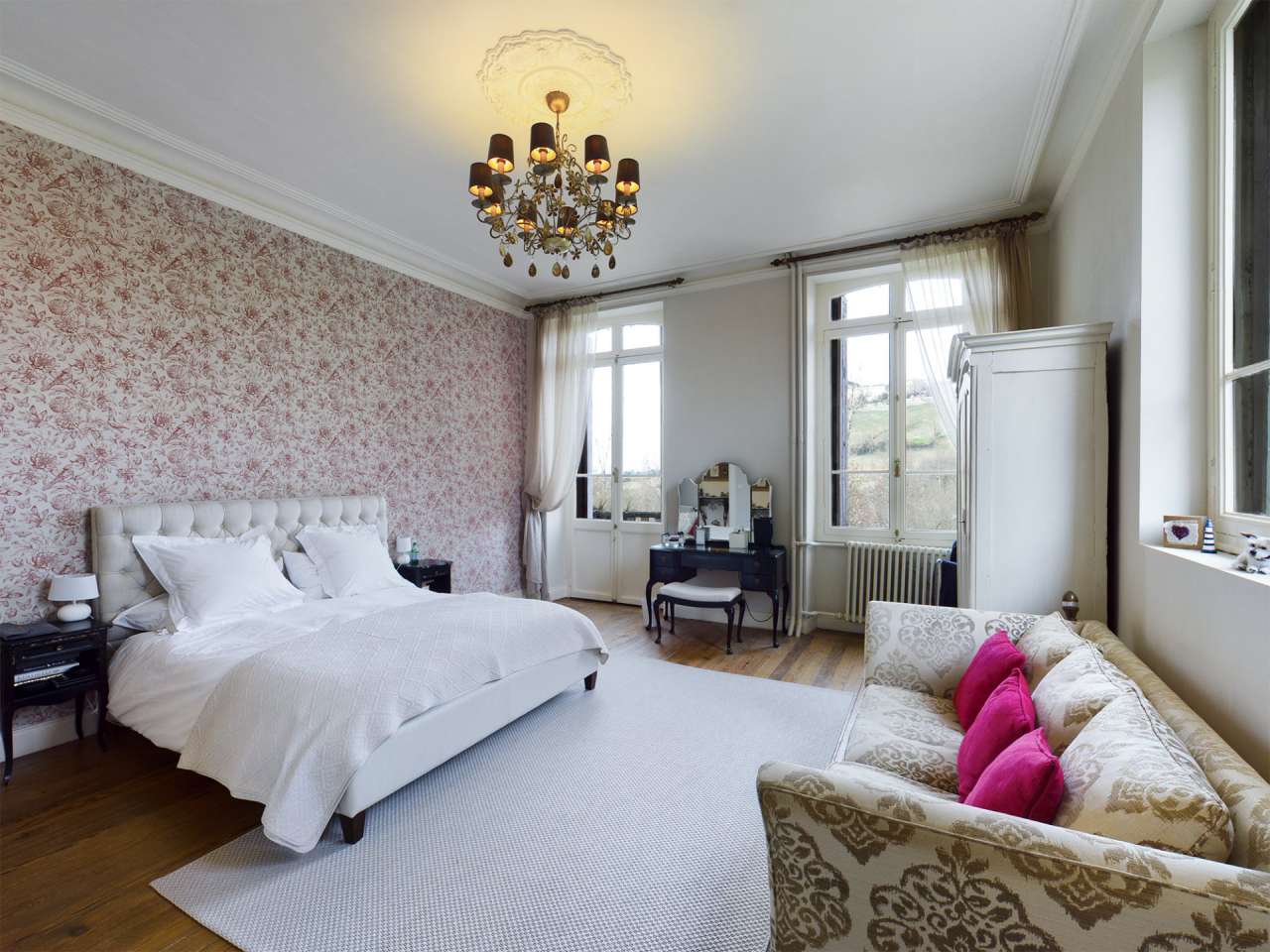 Nestling in over 6 acres of glorious landscaped gardens with pool, woodland