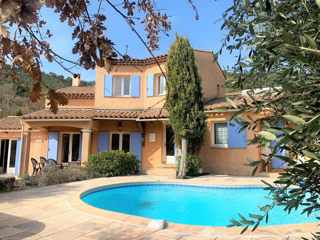 Nestling in beautiful landscaped gardens with pool, is this superb 5 bedroo