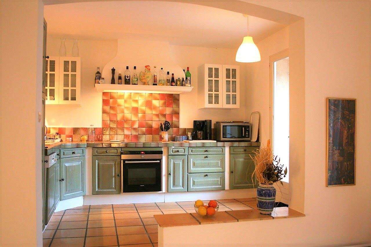 Nestling in beautiful landscaped gardens with pool, is this superb 5 bedroo