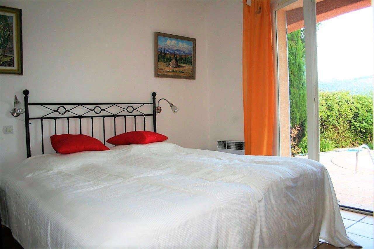 Nestling in beautiful landscaped gardens with pool, is this superb 5 bedroo