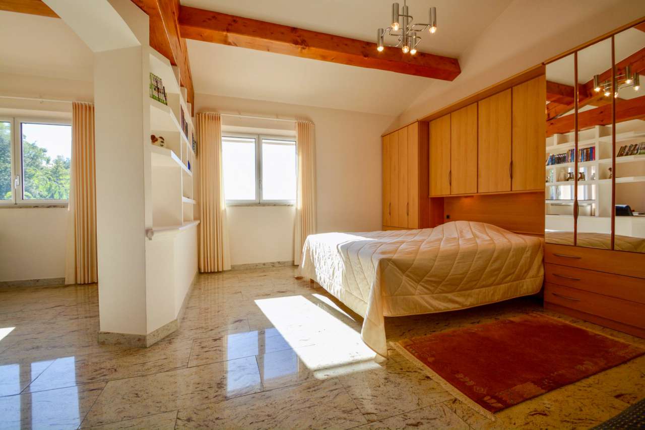 Nestling in over 5.5 acres of glorious landscaped gardens with expansive po