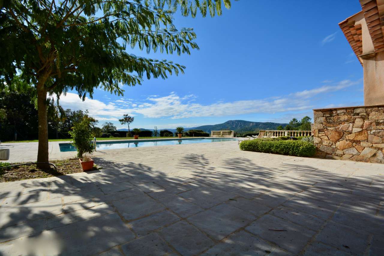 Nestling in over 5.5 acres of glorious landscaped gardens with expansive po