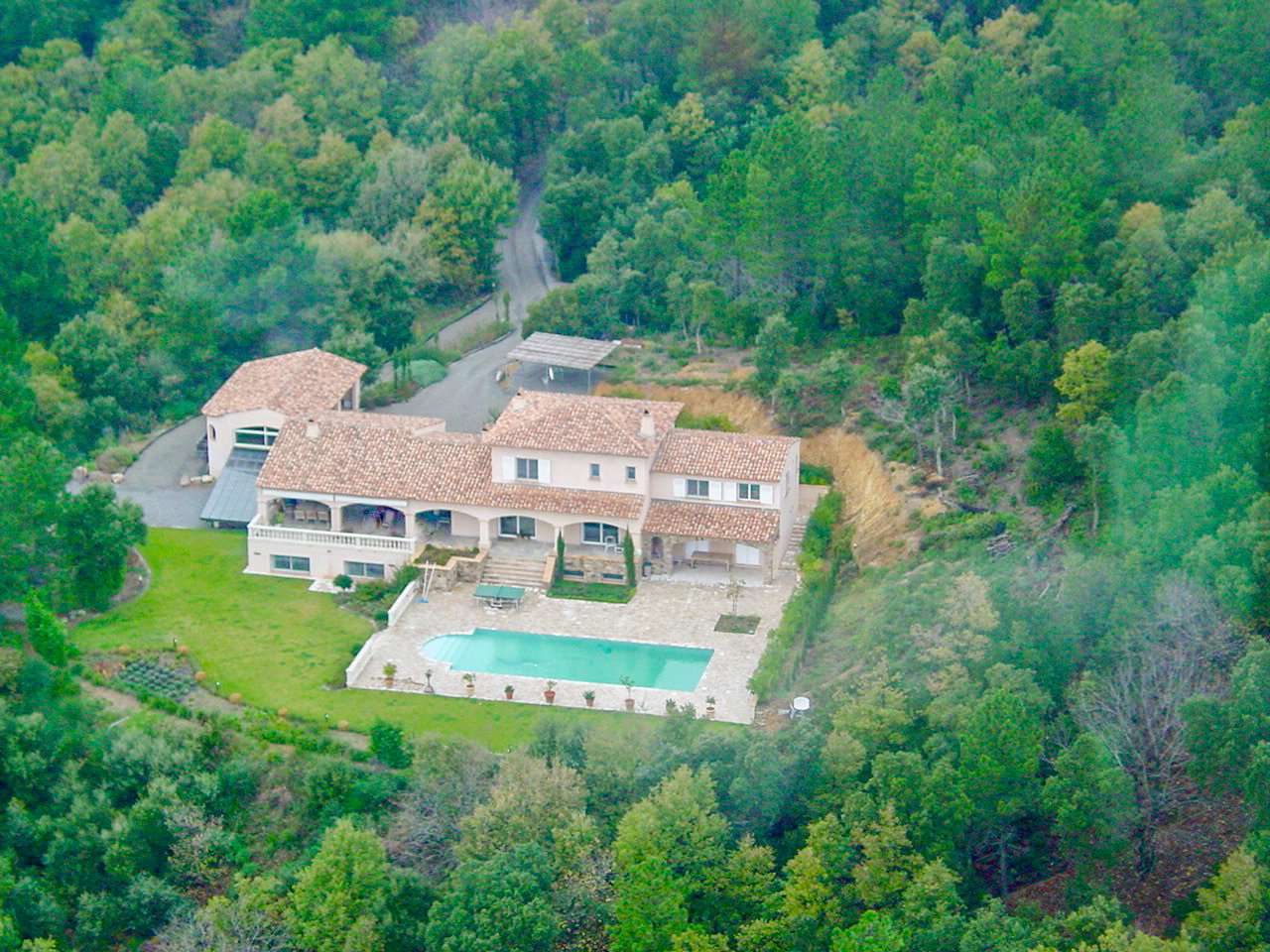 Nestling in over 5.5 acres of glorious landscaped gardens with expansive po