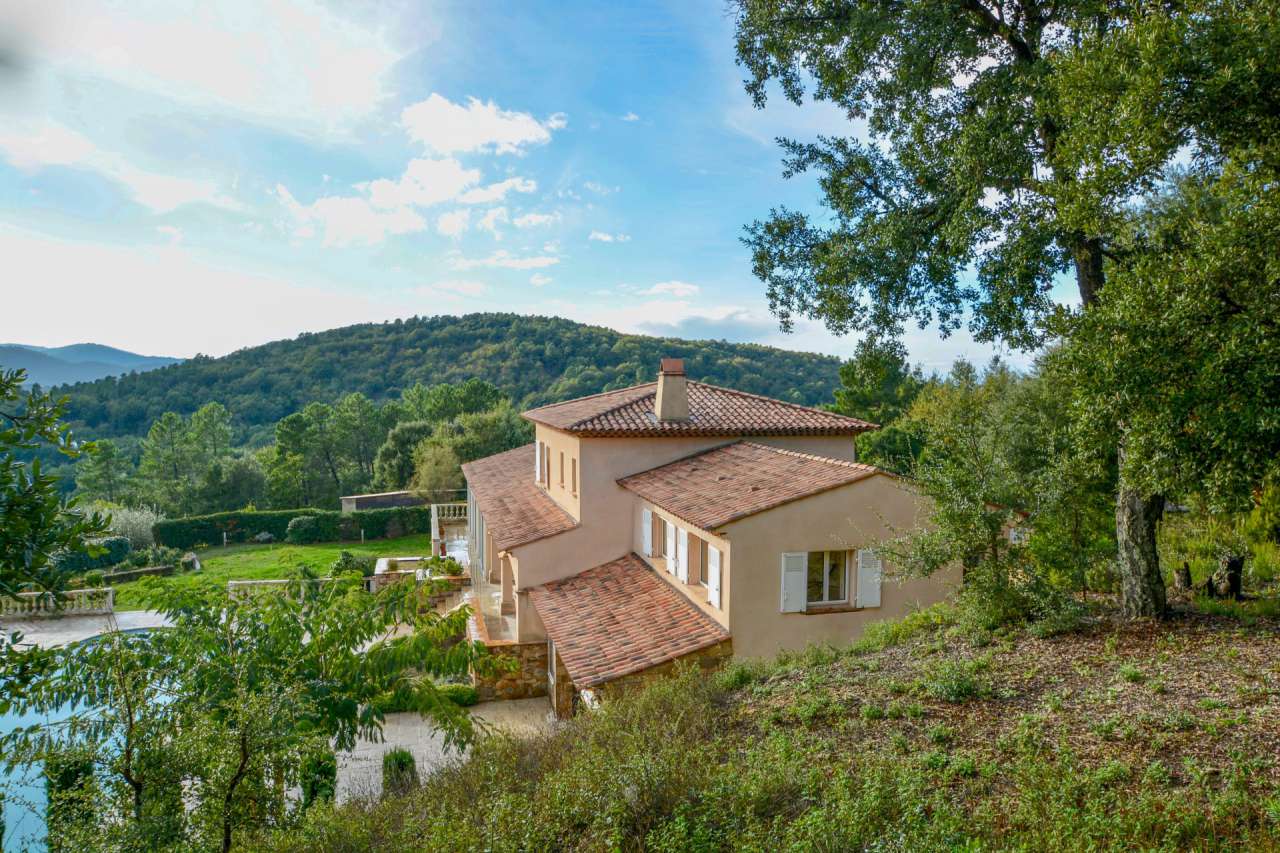 Nestling in over 5.5 acres of glorious landscaped gardens with expansive po