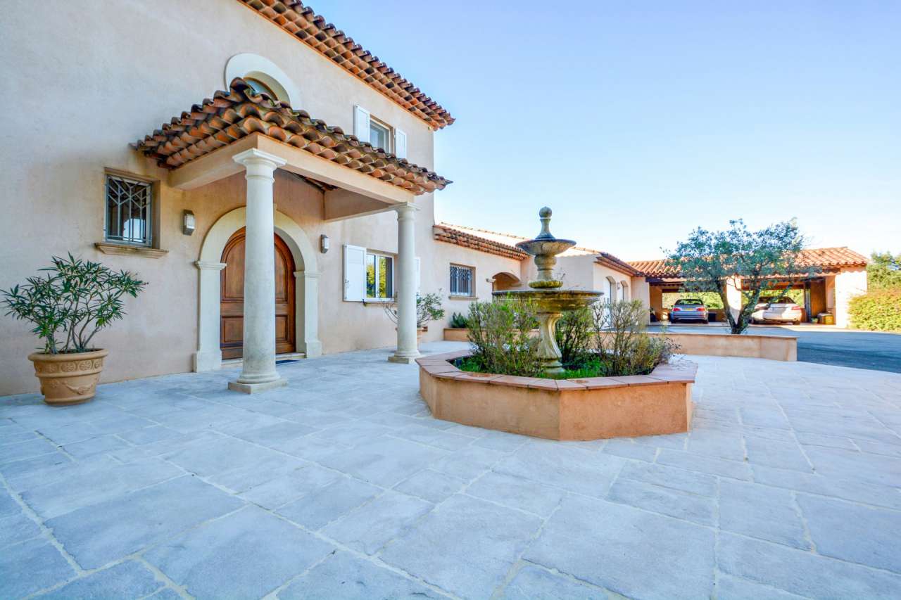 Nestling in over 5.5 acres of glorious landscaped gardens with expansive po