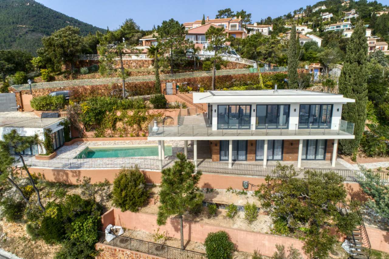Stunning and stylish modern villa in a secure gated area on the hills of Tr