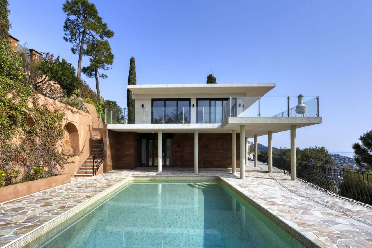 Stunning and stylish modern villa in a secure gated area on the hills of Tr