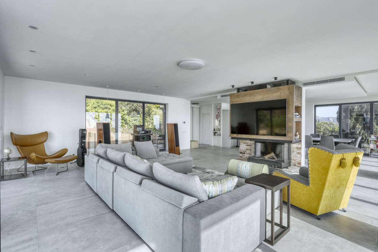 Stunning and stylish modern villa in a secure gated area on the hills of Tr