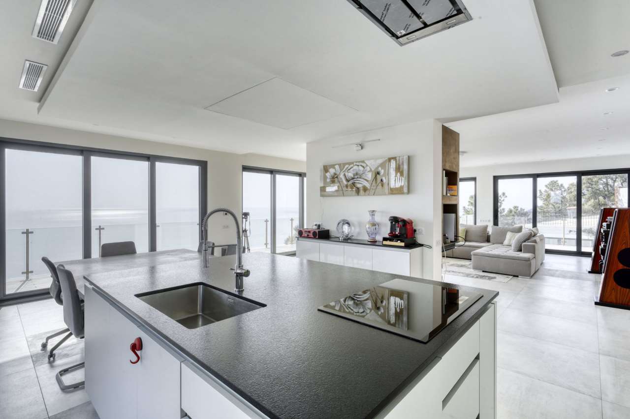 Stunning and stylish modern villa in a secure gated area on the hills of Tr