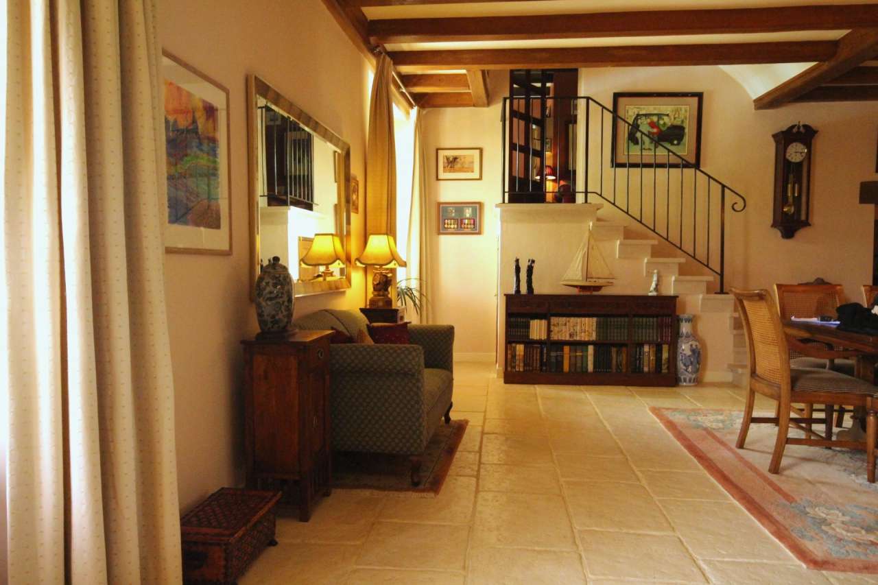 Surrounded by over 8 acres of glorious land with beautiful gardens, pond an