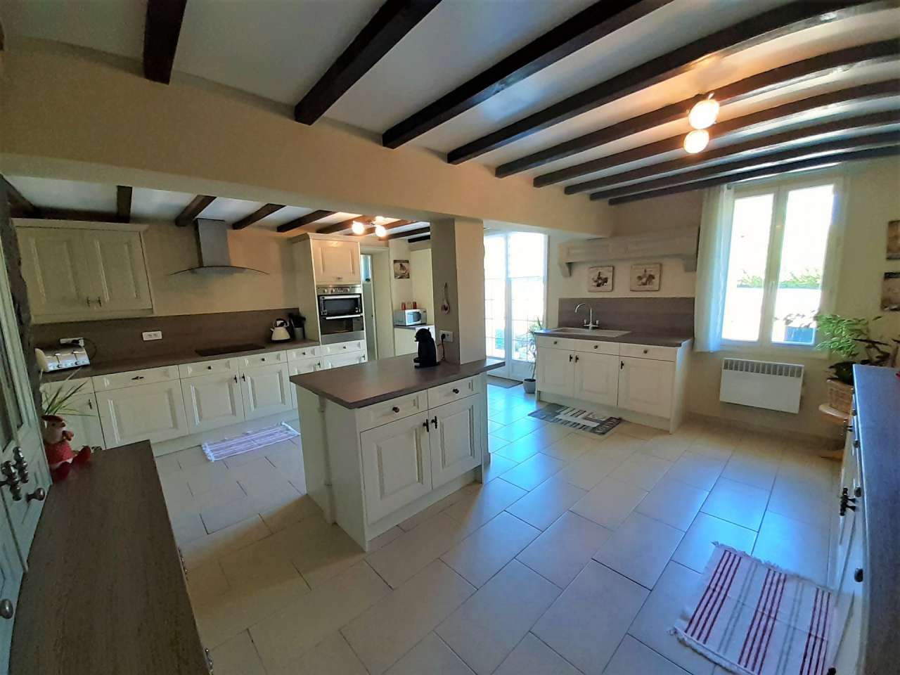 Situated in a quiet and private setting, this superb stone built farmhouse