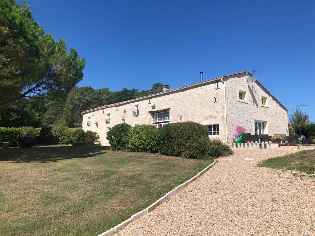 Situated in a quiet and private setting, this superb stone built farmhouse