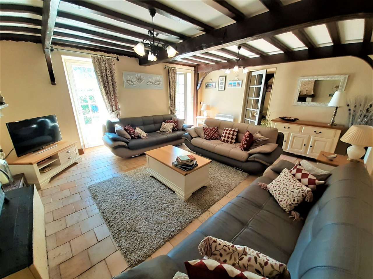 Situated in a quiet and private setting, this superb stone built farmhouse