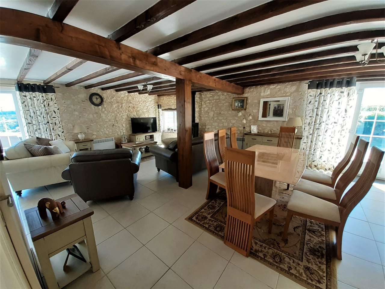 Situated in a quiet and private setting, this superb stone built farmhouse