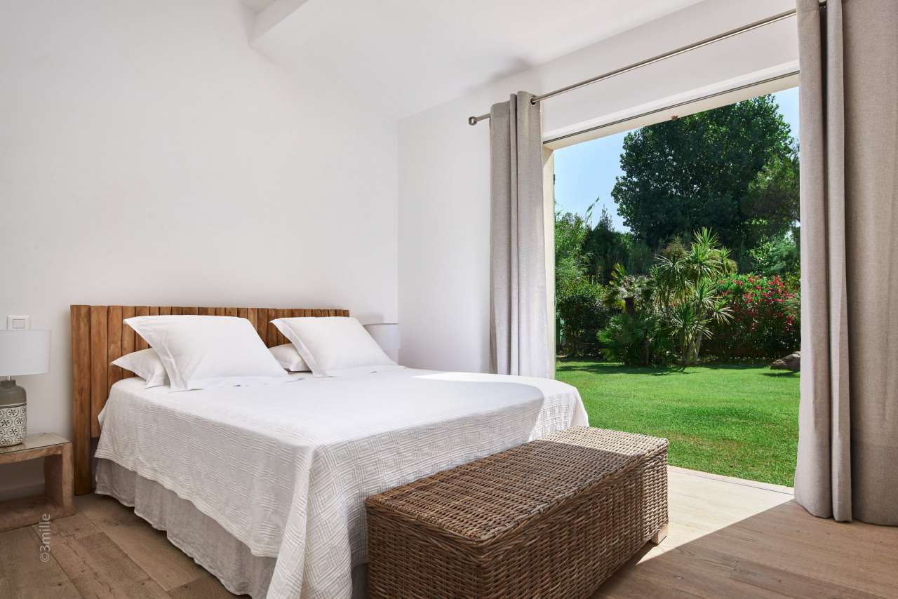 Nestling in over 2 acres of glorious landscaped gardens with pool and viney