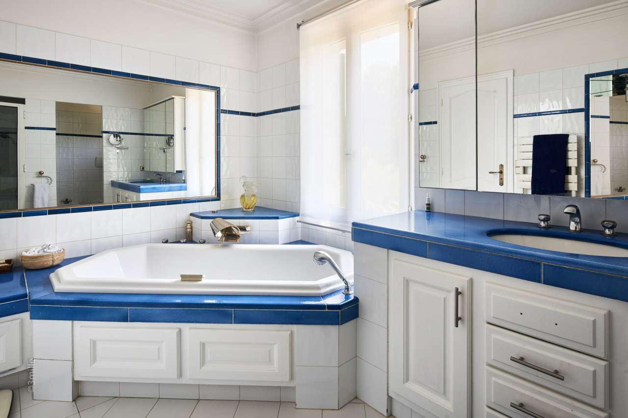 Nestling in over 2 acres of glorious landscaped gardens with pool and viney