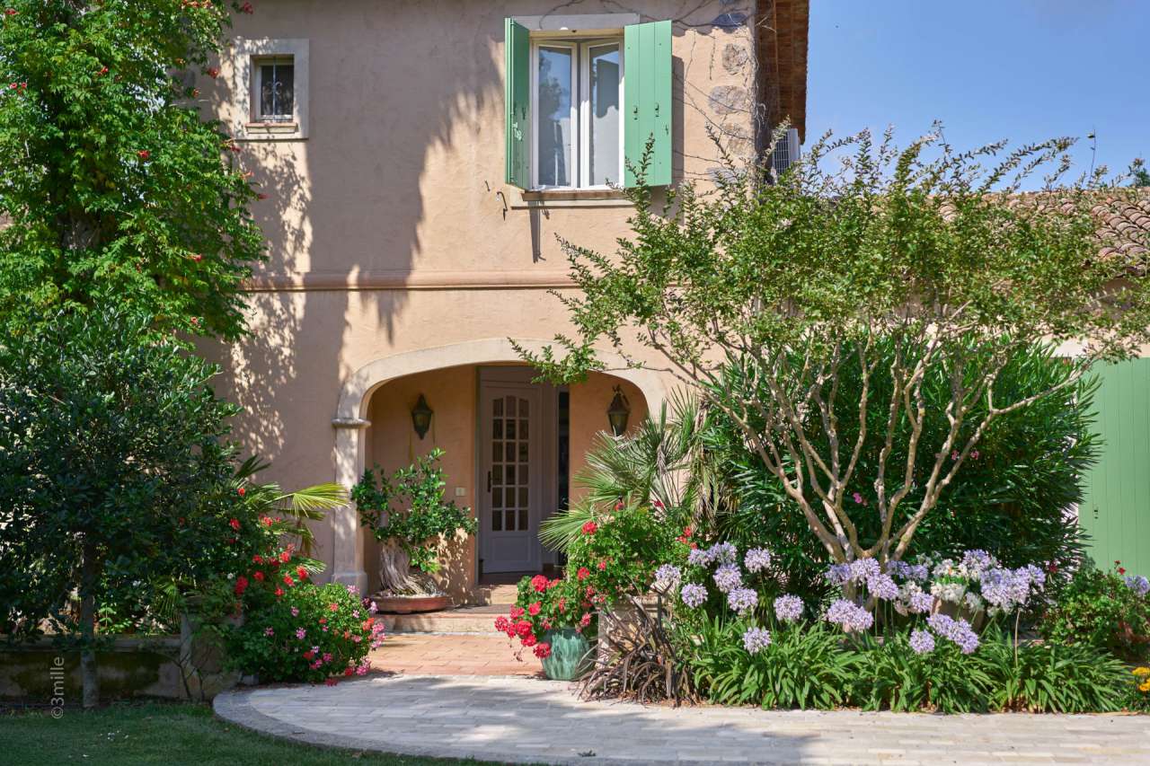 Nestling in over 2 acres of glorious landscaped gardens with pool and viney