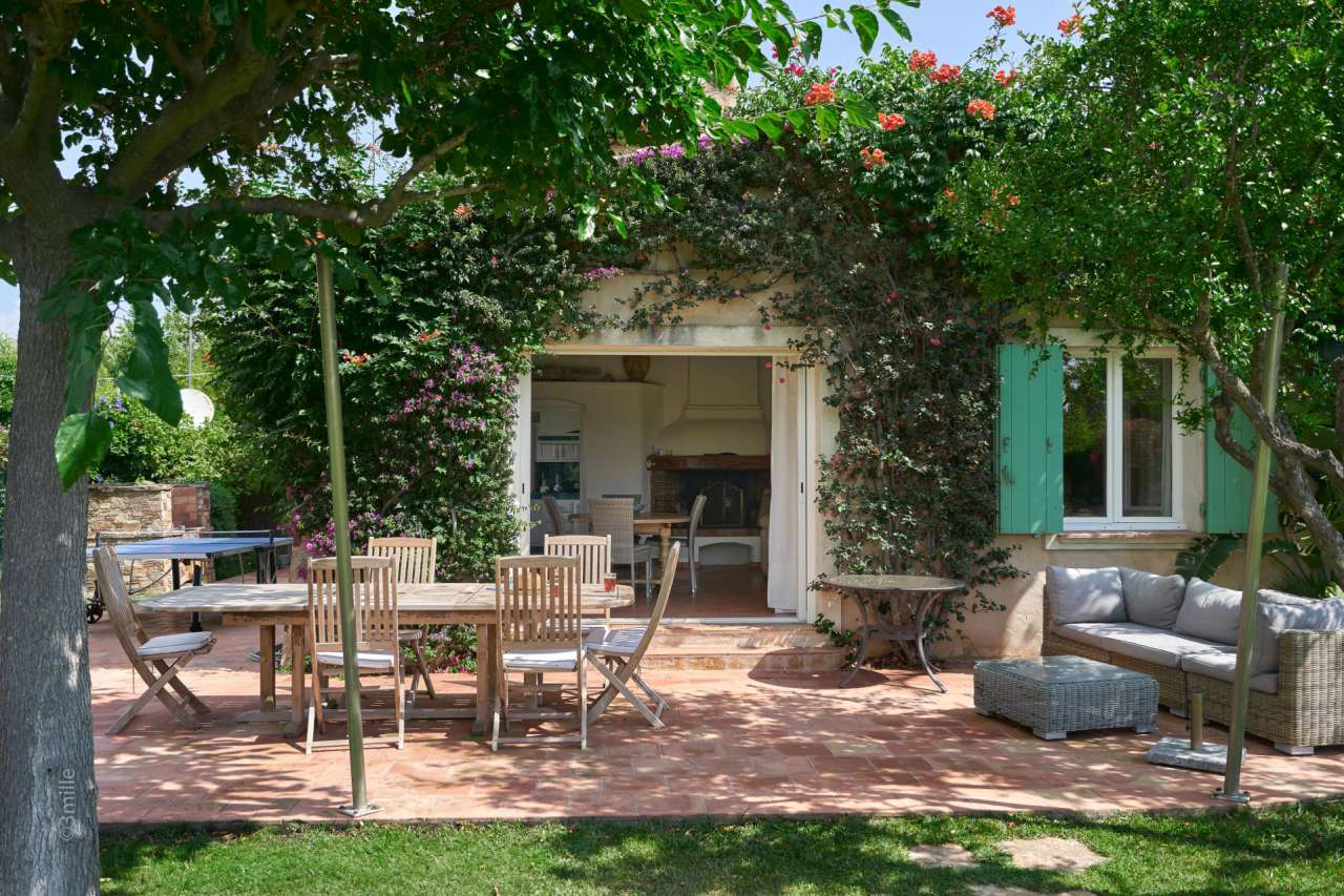 Nestling in over 2 acres of glorious landscaped gardens with pool and viney