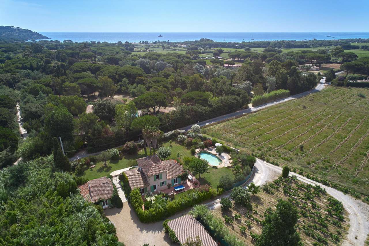 Nestling in over 2 acres of glorious landscaped gardens with pool and viney