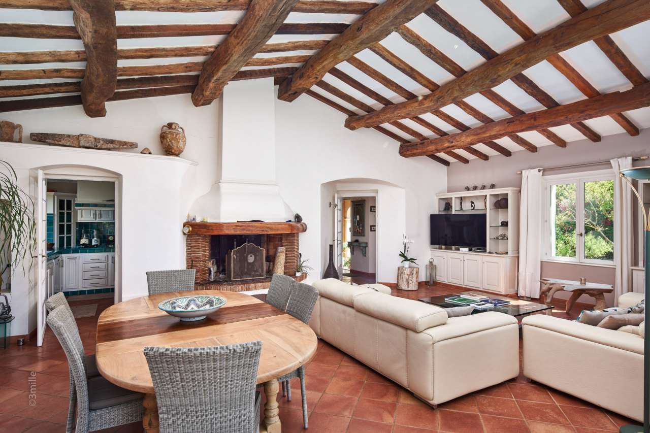 Nestling in over 2 acres of glorious landscaped gardens with pool and viney