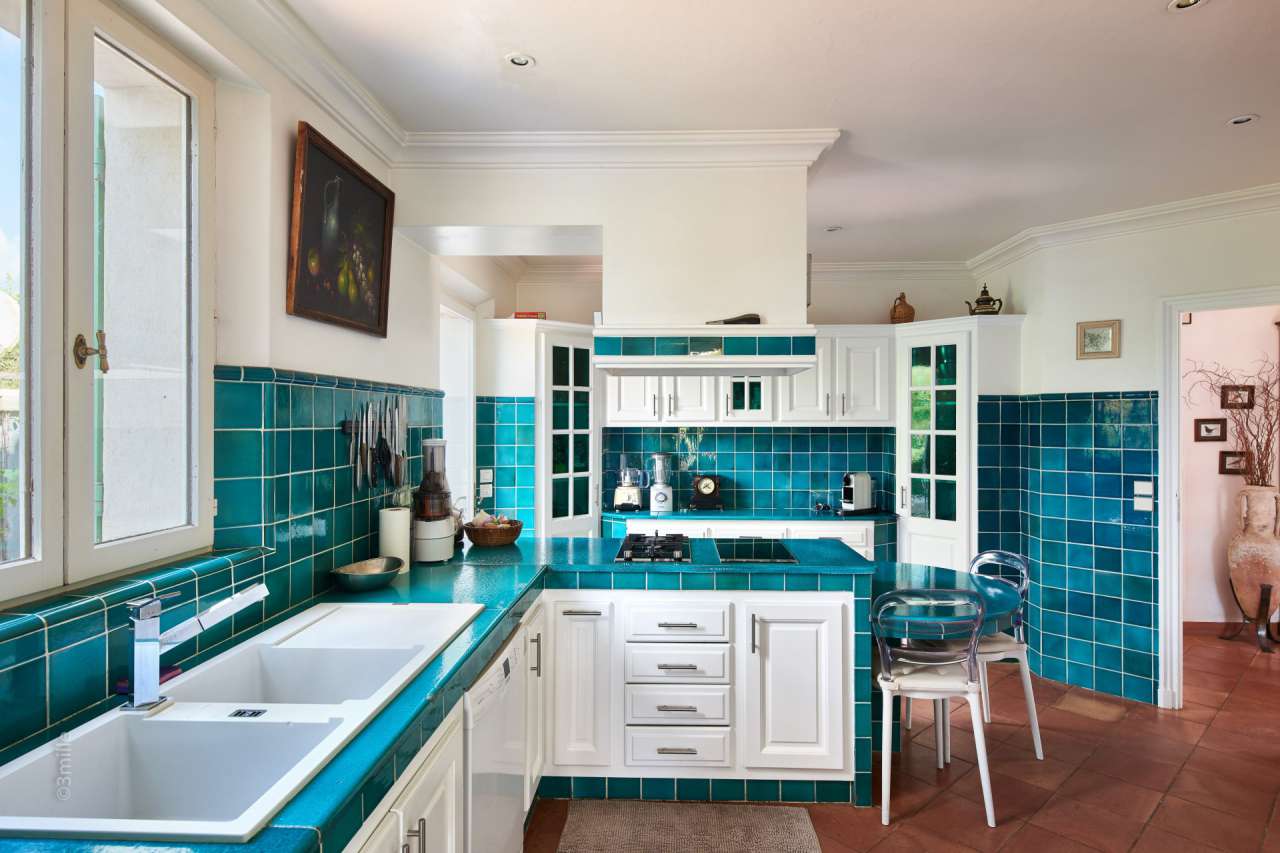 Nestling in over 2 acres of glorious landscaped gardens with pool and viney