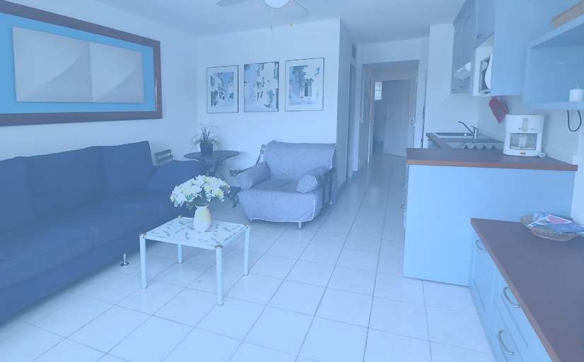 Charming 2 bedroom apartment with communal pool and parking, located near a