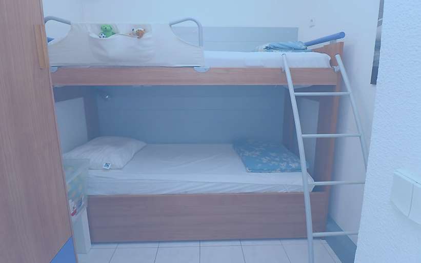 Charming 2 bedroom apartment with communal pool and parking, located near a