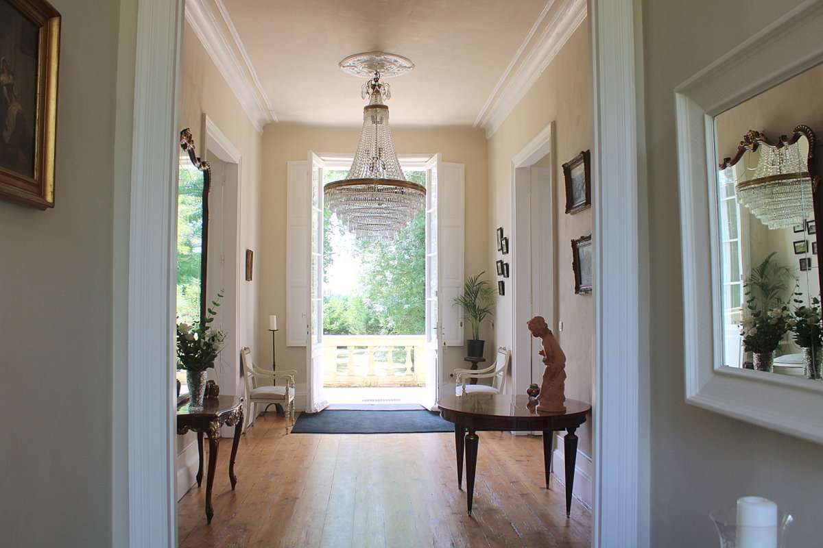 Nestling in nearly 5 acres of glorious landscaped gardens is this beautiful