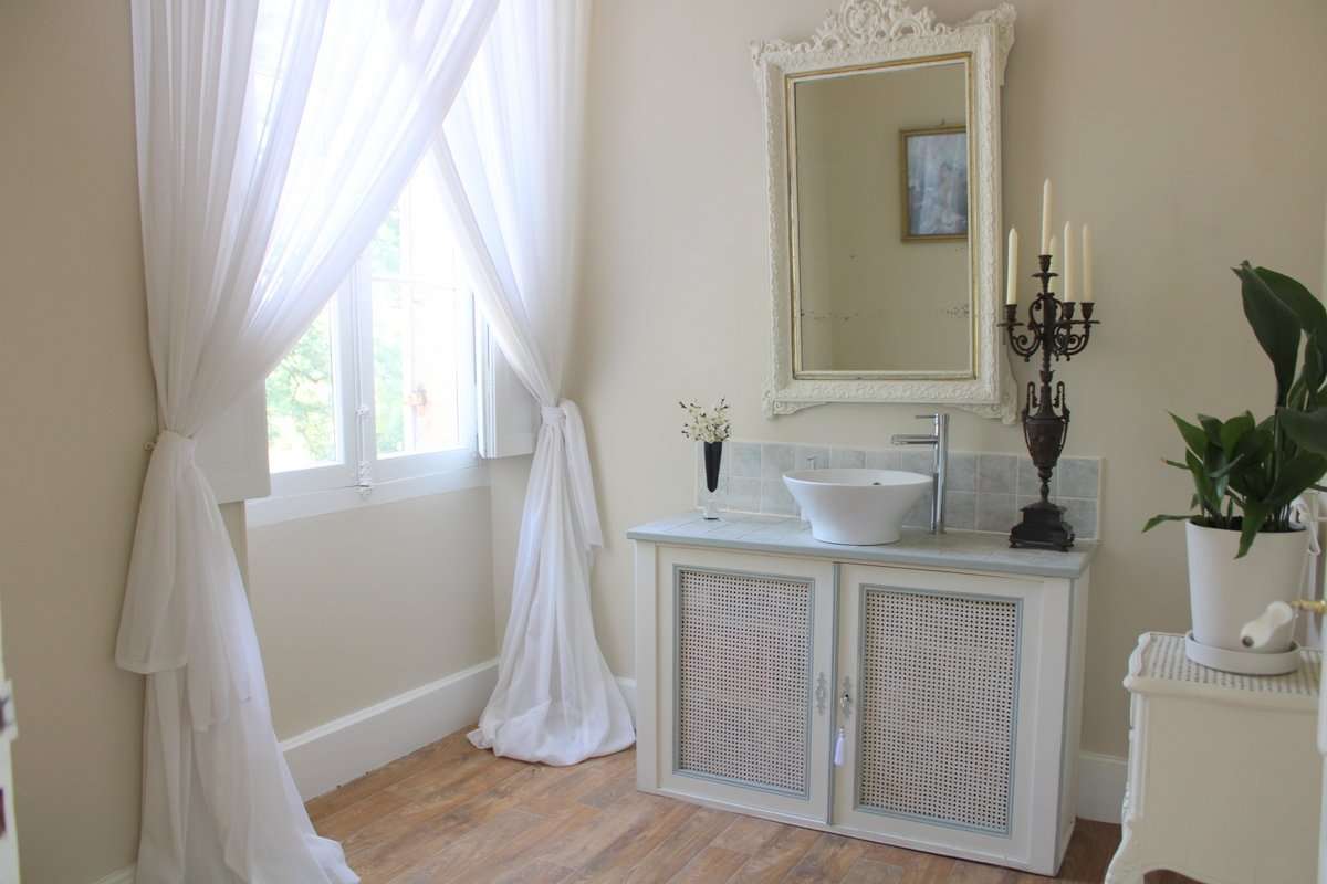 Nestling in nearly 5 acres of glorious landscaped gardens is this beautiful