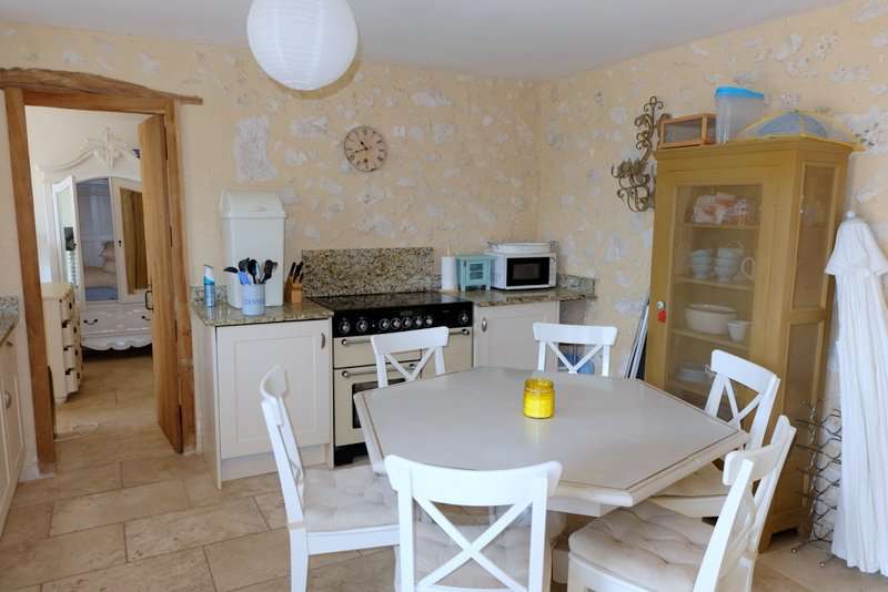 Full of character and charm, this spacious 4 bedroom stone built home is se