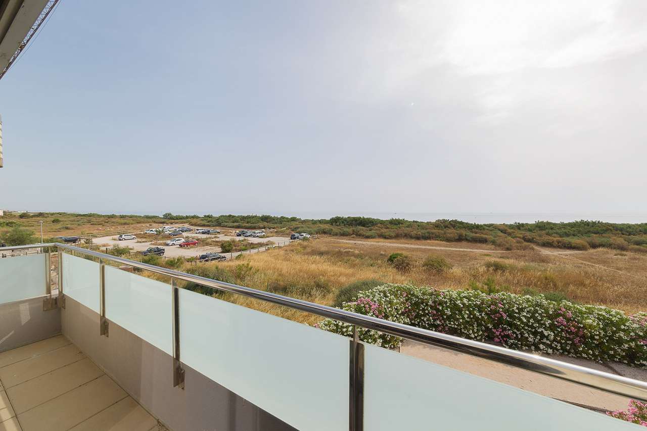 Enjoying panoramic sea views from the roof terrace of its idyllic location