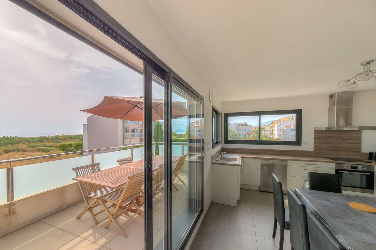 Enjoying panoramic sea views from the roof terrace of its idyllic location