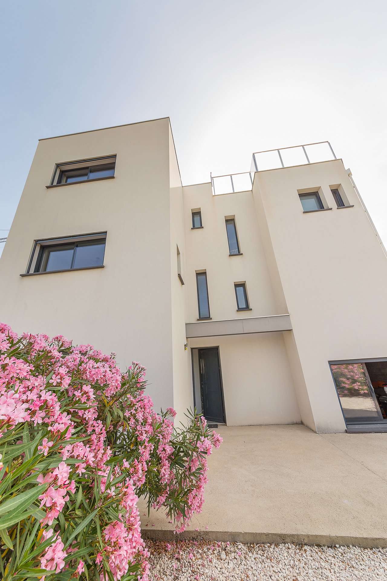 Enjoying panoramic sea views from the roof terrace of its idyllic location