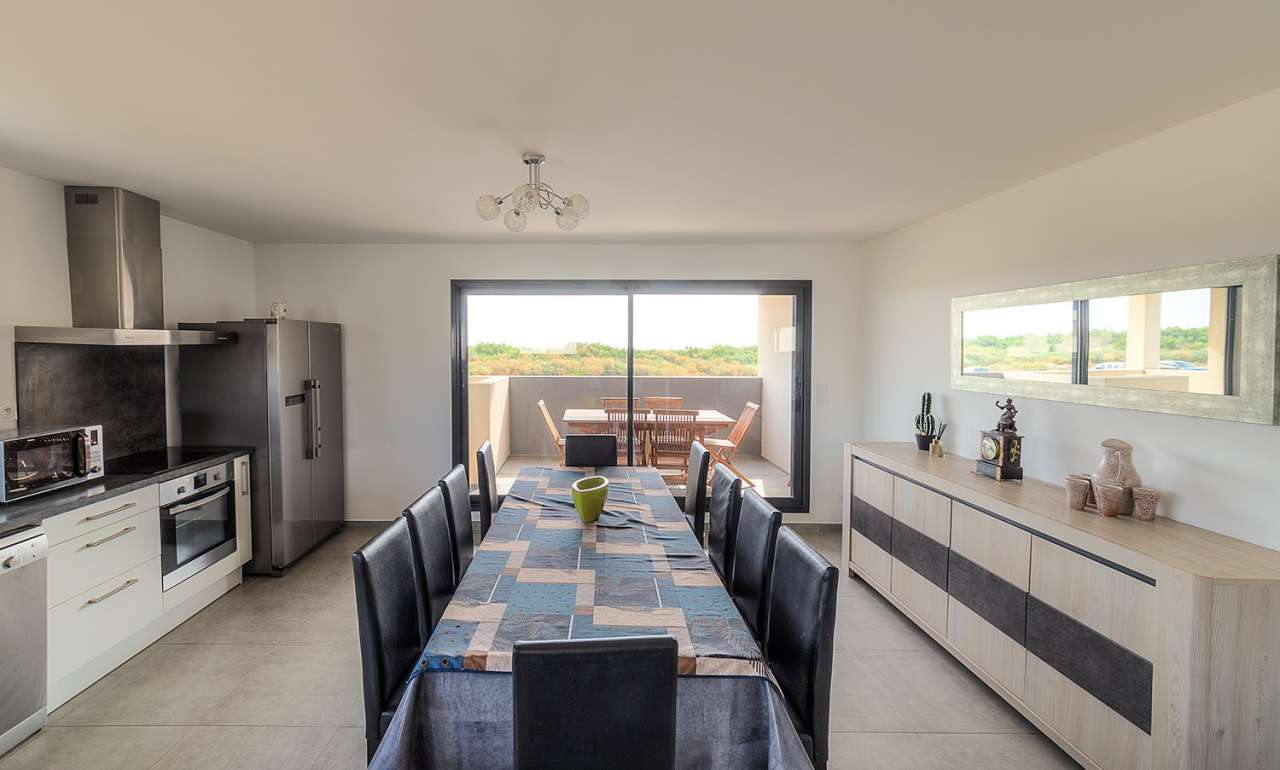 Enjoying panoramic sea views from the roof terrace of its idyllic location