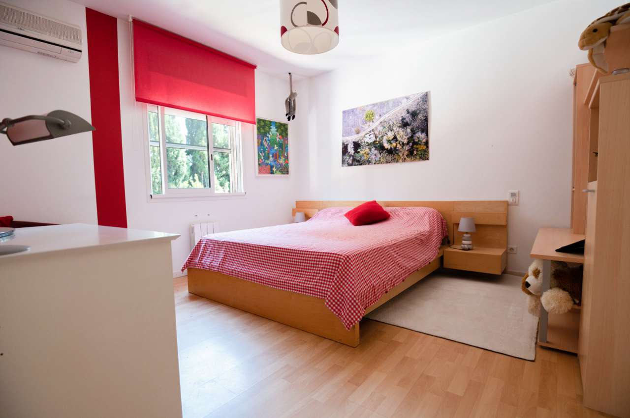 Nestling in 13.5 acres of beautiful landscaped gardens with expansive pool,