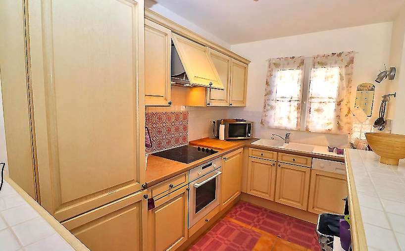 Enjoying scenic river views is this charming 2 bedroom South facing duplex