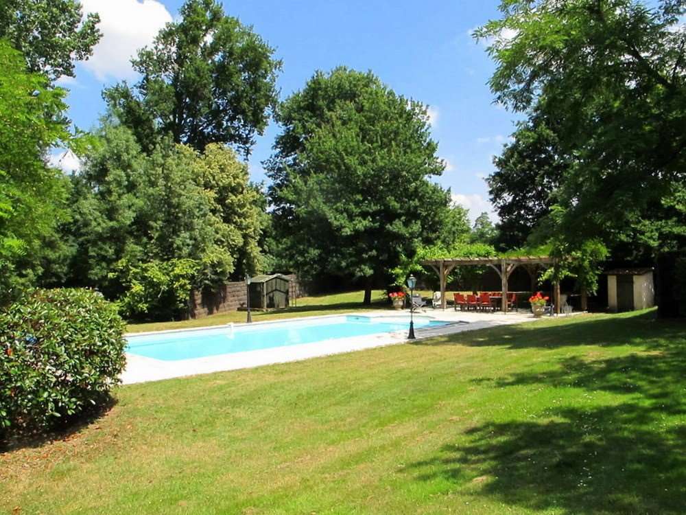 Fabulous character manor house with 2 gites, swimming pool and 5 acres of p