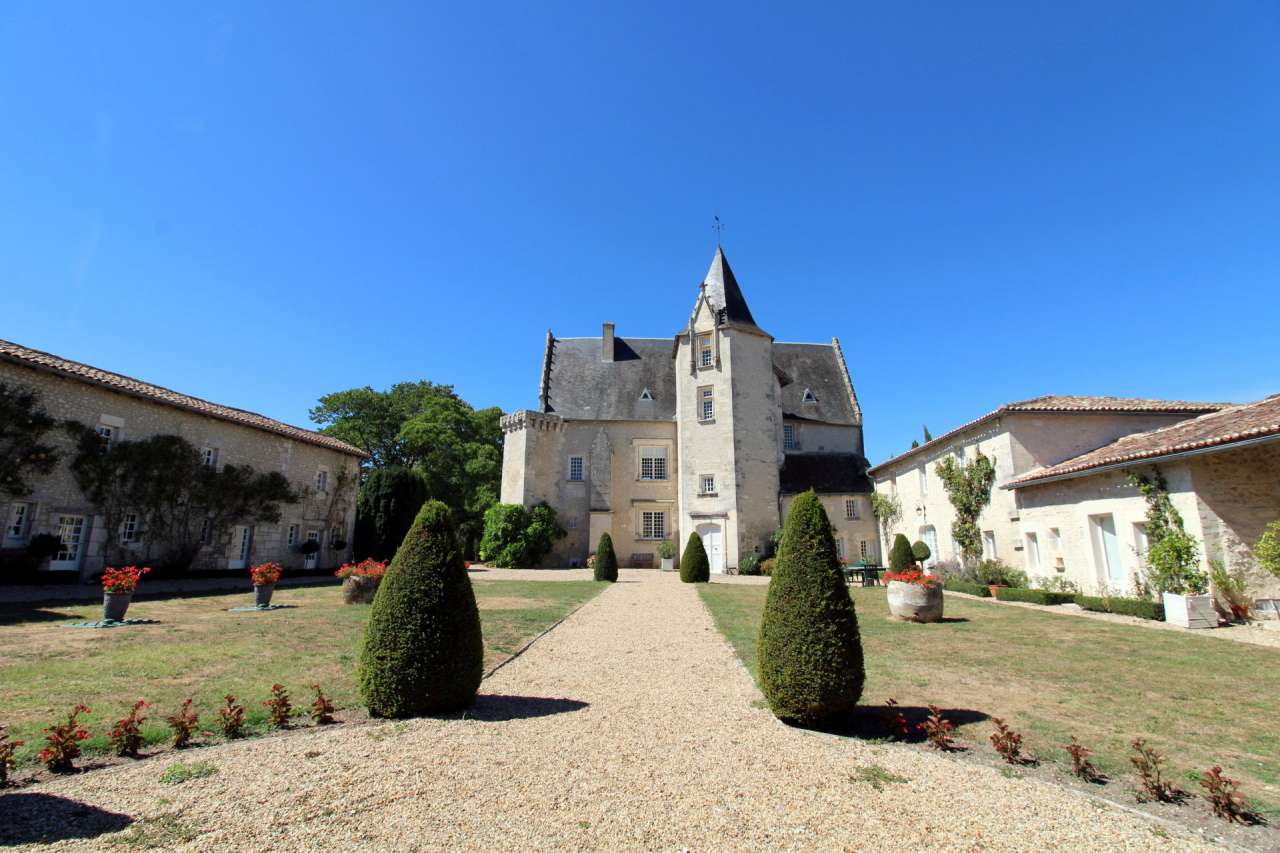 Set within mature landscaped gardens of 7,542m2 with a swimming pool and wi