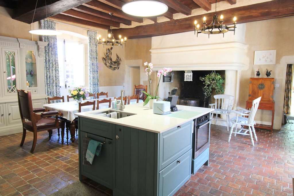 Set within mature landscaped gardens of 7,542m2 with a swimming pool and wi