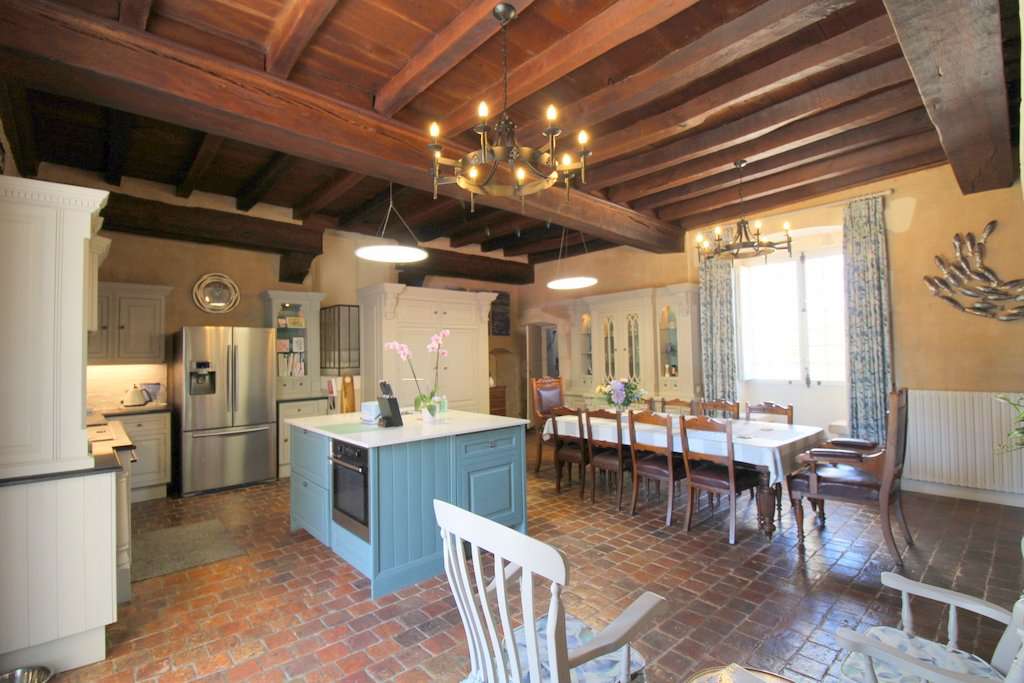 Set within mature landscaped gardens of 7,542m2 with a swimming pool and wi