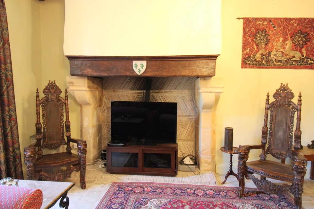 Set within mature landscaped gardens of 7,542m2 with a swimming pool and wi