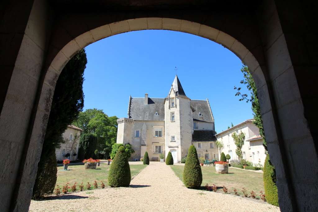 Set within mature landscaped gardens of 7,542m2 with a swimming pool and wi