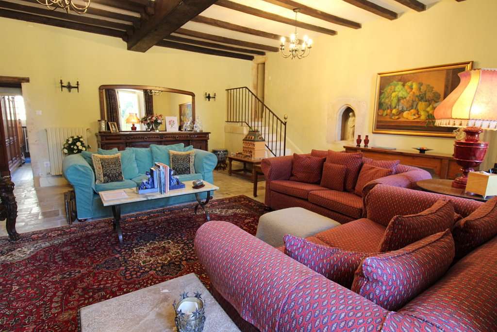 Set within mature landscaped gardens of 7,542m2 with a swimming pool and wi