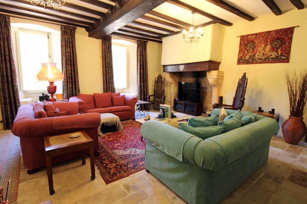 Set within mature landscaped gardens of 7,542m2 with a swimming pool and wi