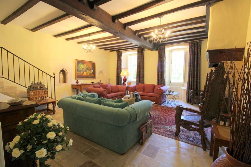 Set within mature landscaped gardens of 7,542m2 with a swimming pool and wi