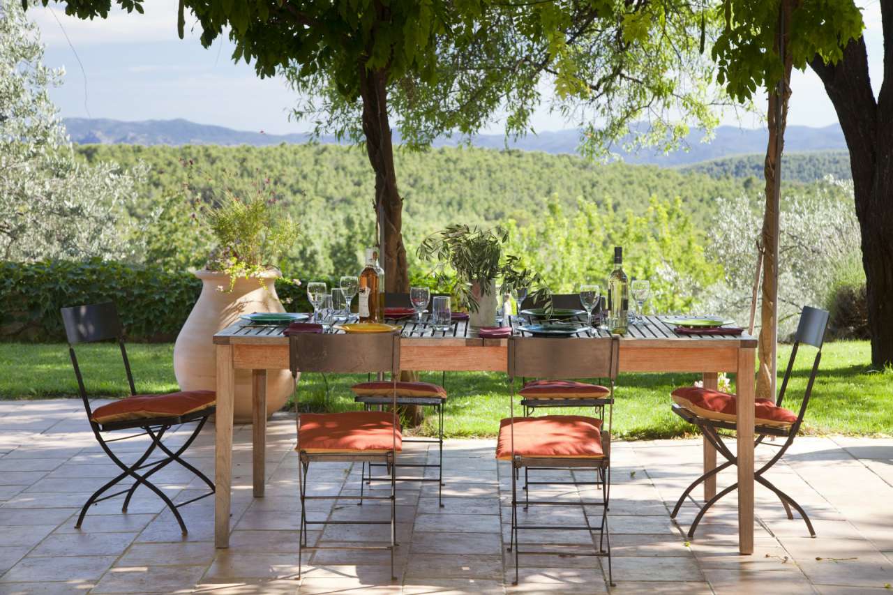 Surrounded by 26.5 acres of glorious land with amazing pool and gardens, is