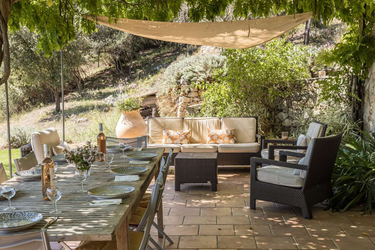 Surrounded by 26.5 acres of glorious land with amazing pool and gardens, is